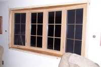 The two outer windows crank out to open