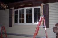 Not finished on the outside.  They have to come back and add trim on both sides.