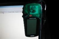 Everyone loves a blury picture of a handheld GPS system.
