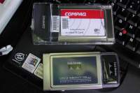 A closeup of the two 802.11b NICs used in the laptop. The Compaq WL110 is the primary NetStumbler NIC. The Cisco AIR-PCM350, with custom drivers, is necessary to operate the Wildpackets Airopeek NX wireless sniffer.