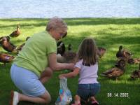 Harley and I trying to get them to take the bread from our hands.