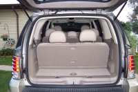 Back without seats folded down.  Has radio and air/heat controls for back seat.  